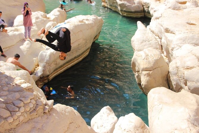 4 Days 3 Nights Package Oman Private Tour - Day 1: sinkhole, beach, and the long walk into Wadi Shab