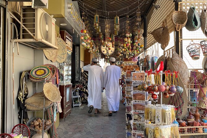 AMOUAGE: Full Day Private Tour to Nizwa and Jebel Akhdar - Nizwa Souq: dates, silver, and everyday Oman