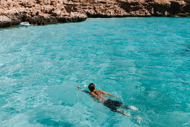 Dimaniyat Island Tour on Glass Bottom Boat (Muscat) - Snorkeling and swimming with marine life