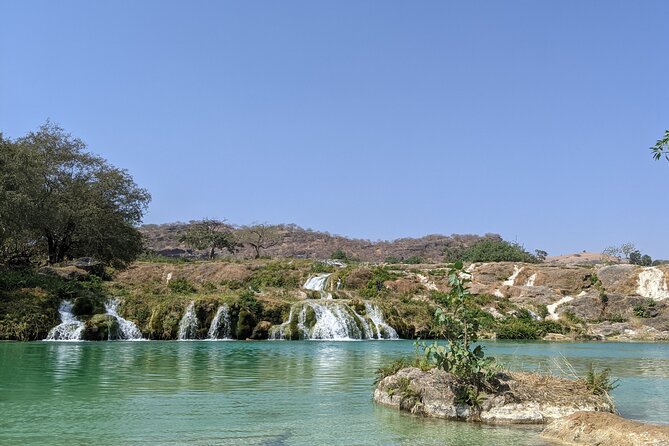 East and West Salalah Combination Private Full-day Tour - Wadi Darbat: waterfalls, camels, and mountain water