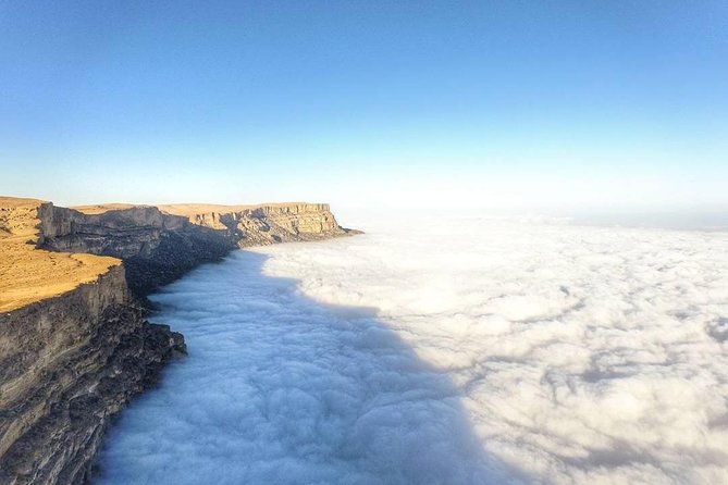Explore Samhan Mountain – Half-Day Getaway with Lunch Included. - Wadi Darbat, camels, and seasonal water