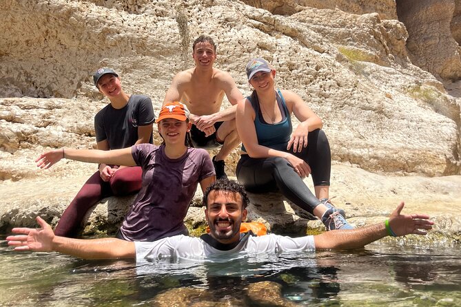 from muscat wadi shab and bimmah sinkhole tour - Crossing the entrance to Wadi Shab