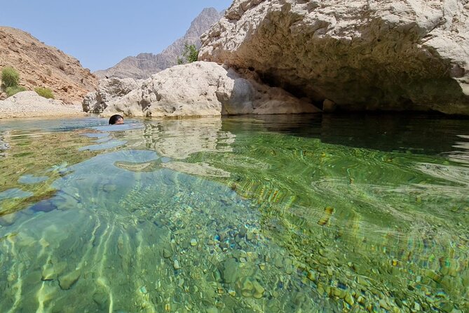 Full-Day Bimmah Sinkhole and Wadi Al Arbeieen Tour - A quiet stretch at Fins Beach