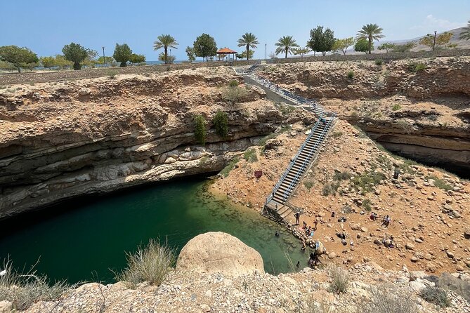Full Day Private Tour to Wadi Shab and Bimmah Sinkhole - The Wadi Shab walk, pools, and cave