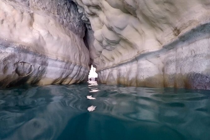 Full Day Wadi Shab And Bimah Sinkhole with Pick Up Included - Swimming through the narrow cave to the waterfall