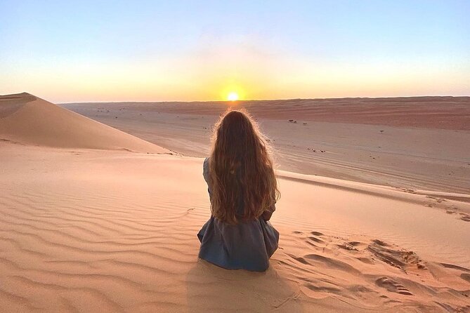 Full-Day Wahiba Desert and Wadi Bani Khalid Group Tour - The long road from Muscat