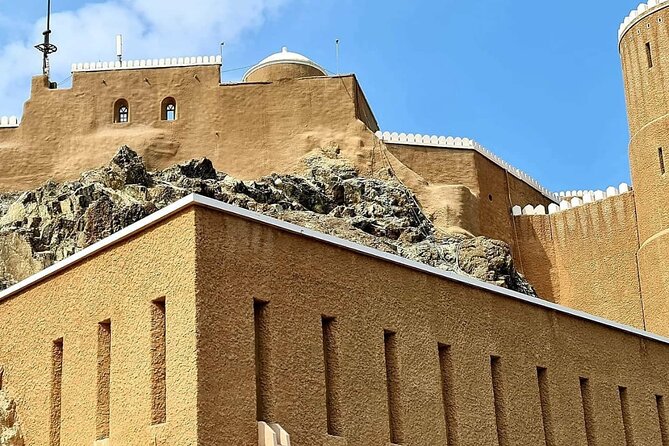 Half-Day Private Muscat City Tour - Top Landmarks in Just 4 Hours - Qurum Beach with bread, honey, and karak tea