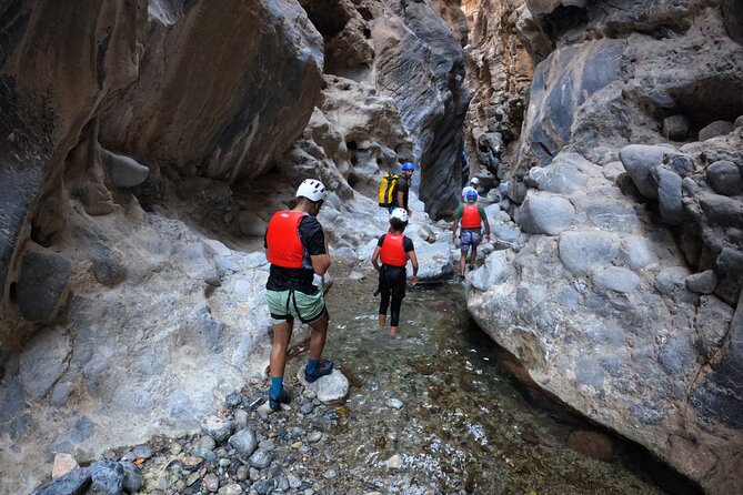 Half Day - Snake Canyon Adventure Tour in Jebel Shams - Hiking, boulders, and the first water sections