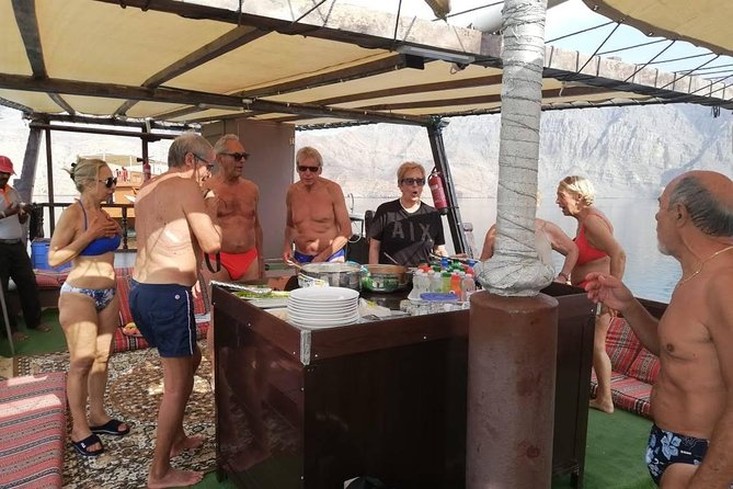 Khasab Dhow Cruise Full day, Buffet Lunch on Board, swimming - An Omani lunch served on board