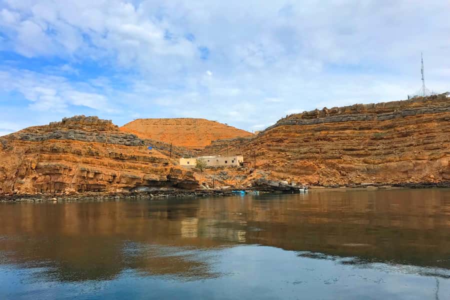 Khasab: Dolphin Watching Day Tour with Snorkeling & Lunch - Passing Sham village on the way back