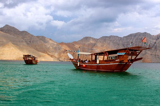 Khasab Musandam Half Day Dhow Cruise and Snorkeling Trip - Dolphin spotting on the way to Telegraph Island
