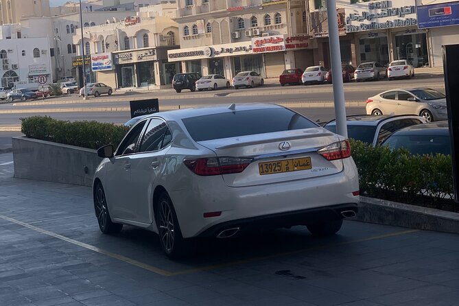 Muscat : Luxury car with private driver - Comfort, water, and what is not included