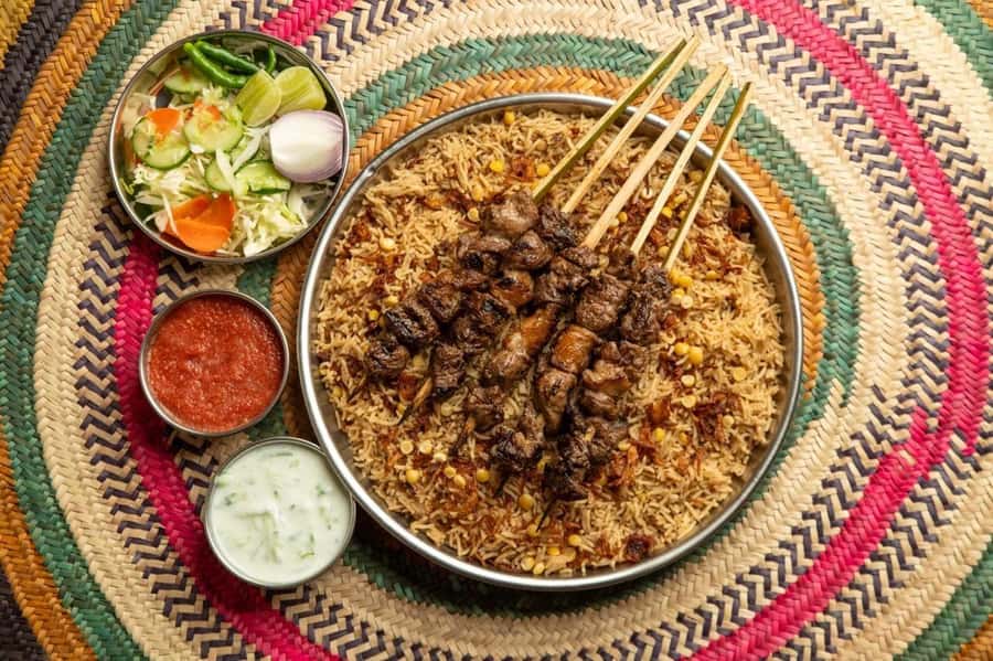 Muscat: Omani Food Tour with Shuwa & Halwa - Mishkak finishes the meal with smoke and spice
