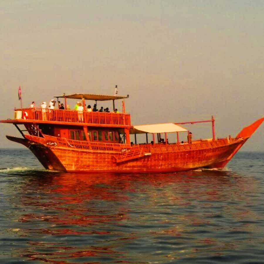 Muscat: Omani Traditional Dhow Sunset Cruise - Pickup in Muscat and the short ride to the harbor