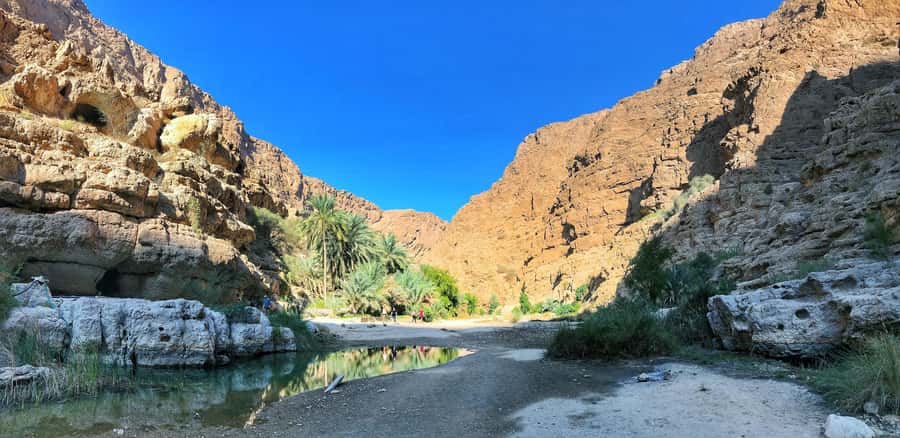 Muscat: Wadi Shab and Bimmah Sinkhole Full-Day Tour - Wadi Shab’s cave waterfall is worth the long ride