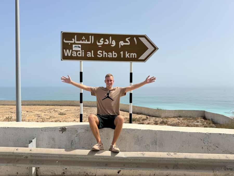 Oman’s Hidden Gems: Wadi Shab & Bimmah Sinkhole - Crossing the water to the Wadi Shab trail