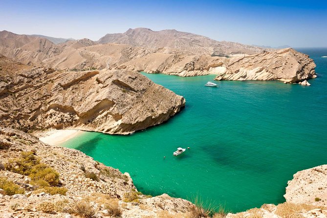 Omani Dhow Coastal and Sunset Cruise - A sunset view of Muscat from a traditional dhow