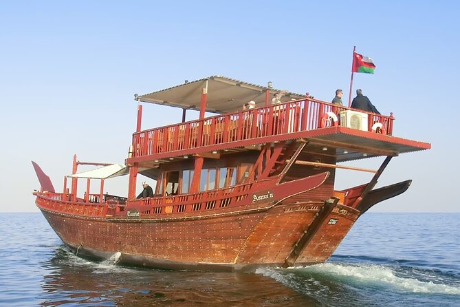 Omani Traditional Dhow Cruise: Sunset and Muscat Coastal View - Sunset, lights, coffee, and dates