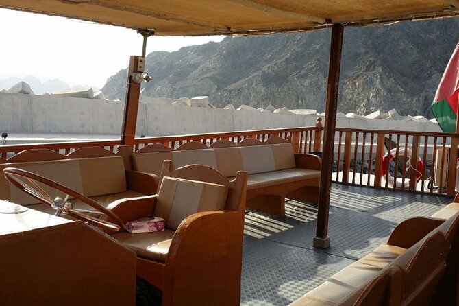 Omani Traditional Dhow Cruise: Sunset and Muscat Coastal View - What the crew adds to the evening