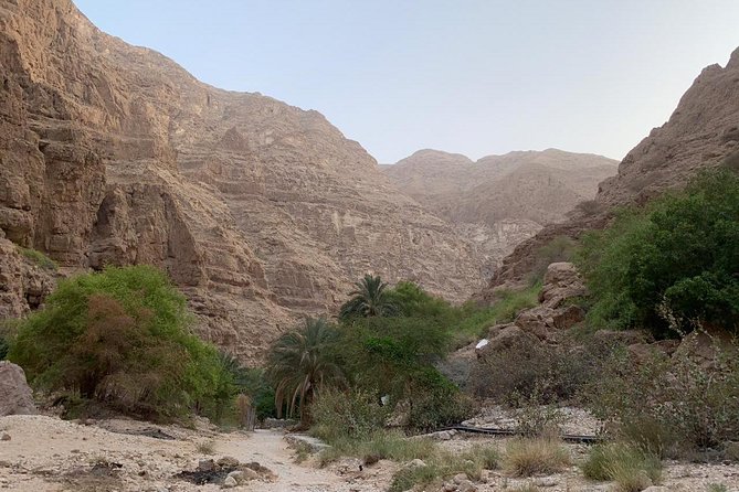 Private Day Trip to Wadi Shab, Fins Beach & Bimmah Sinkhole - Swimming from pool to pool