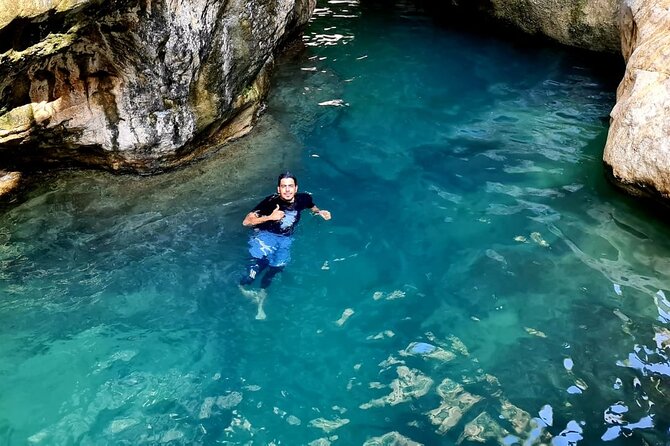 Private Full-Day Wadi Tiwi and Bimmah Sinkhole Tour from Muscat - Fins Beach and the white coastal finish