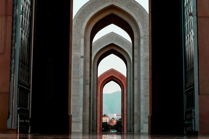 Private Half-Day Muscat City At Night Tour - Qurum Beach to close the evening