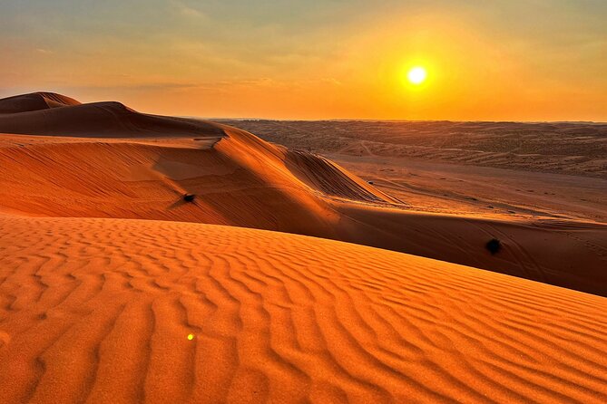 Private Watching Sunset Desert Safari Tour - Entering Wahiba Sands in a private 4WD