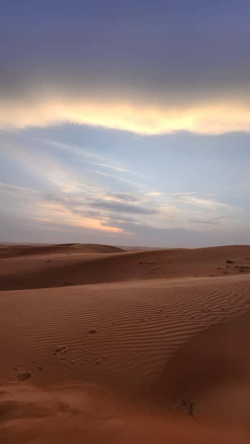 Sunset at wahiba desert - The long return to Muscat