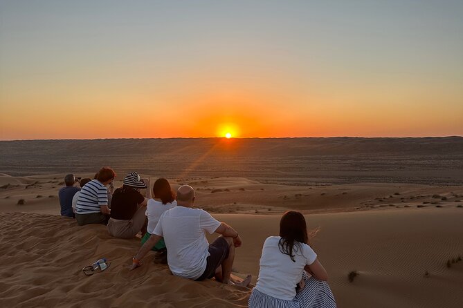 Sunset in Wahiba Sands 4x4 Adventure - Omani dinner under the stars