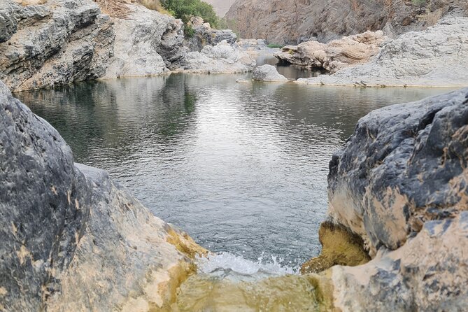 Wadi Al Arbeieen Sinkhole & Fins Beach Swim & Hike - Fins Beach brings the day back to sea level