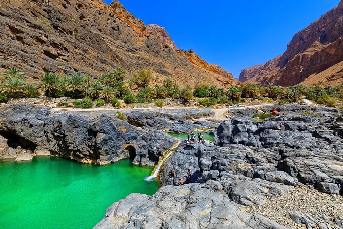 Wadi Arbeieen Tour - The main pool, waterfall, and cliff jumps