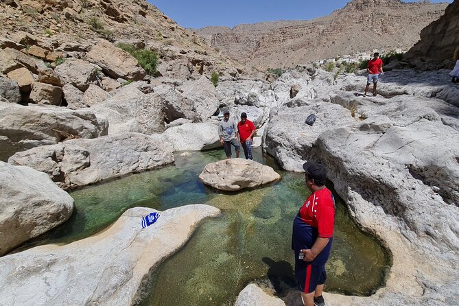 Wahiba Sands Desert and Wadi Hawar Private Tour - Wadi Hawar: boulders, waterfalls, and clear pools